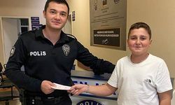 12 yaşındaki Canpolat, bankamatikte bulduğu parayı polise teslim etti