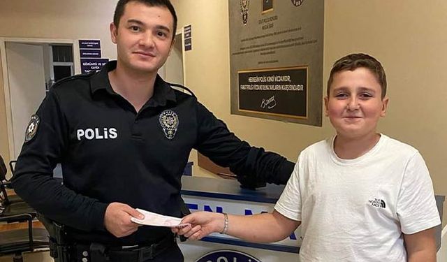 12 yaşındaki Canpolat, bankamatikte bulduğu parayı polise teslim etti